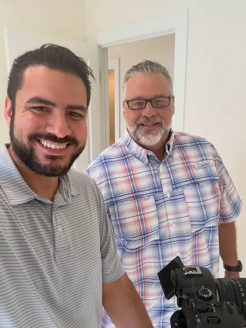 Kerlie with an agent at a listing