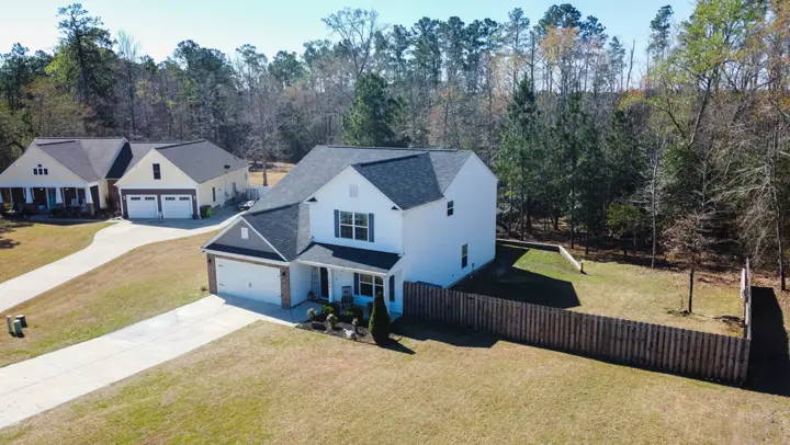 Aerial photo of a home and its lot
